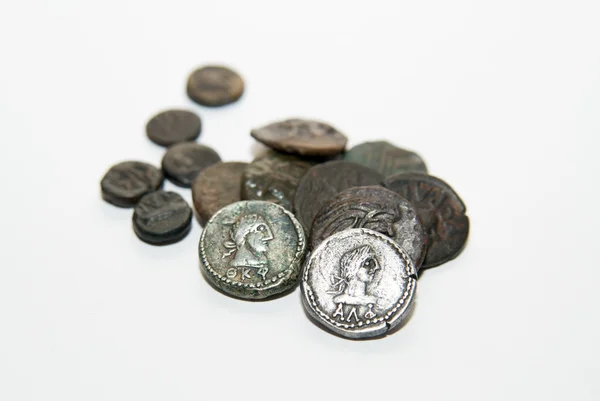 Vintage coins with portraits of kings on over white — Stock Photo, Image