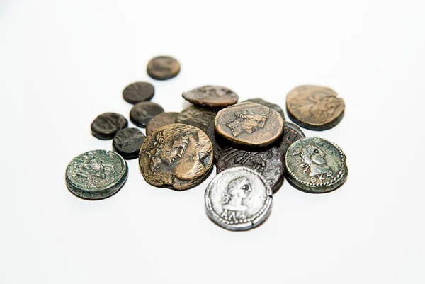 Vintage coins with portraits of kings on over white — Stock Photo, Image