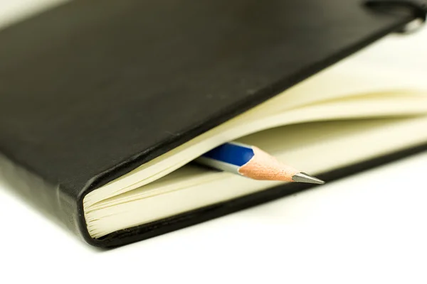 Diary and pencil on over white — Stock Photo, Image