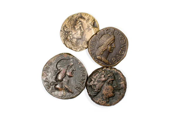 Ancient  bronze coins on a white background — Stock Photo, Image