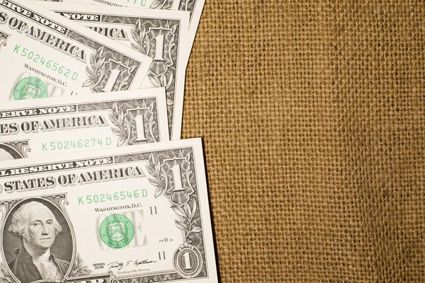 Billets de 1 dollar US sur un ancien sac — Photo