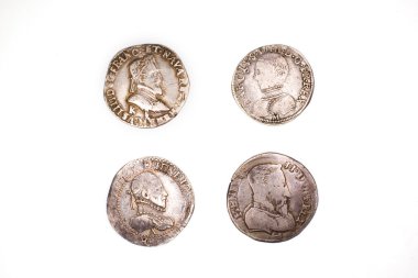 Vintage  coins with portraits on a white background clipart