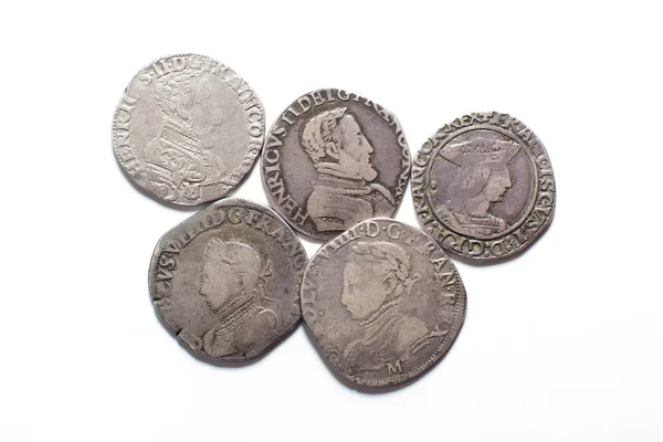 Vintage silver coins with portraits on a white background — Stock Photo, Image