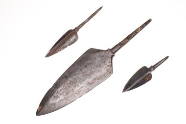 Three ancient arrowheads on a white background clipart