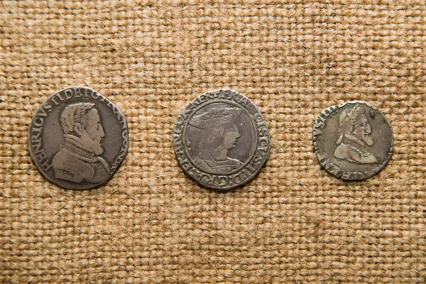 Ancient French silver coins with portraits of kings on the old c — Stock Photo, Image