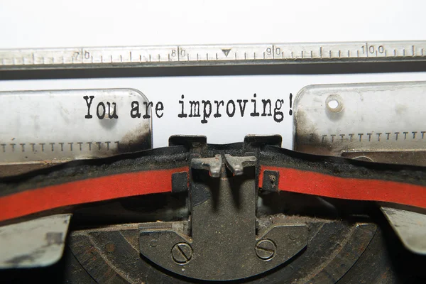 Sheet of paper with the inscription "You are improving" — Stock Photo, Image