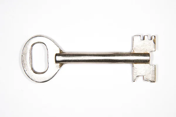 Ένα παλιό κλειδιά στο ασφαλές σε λευκό φόντο — Φωτογραφία Αρχείου
