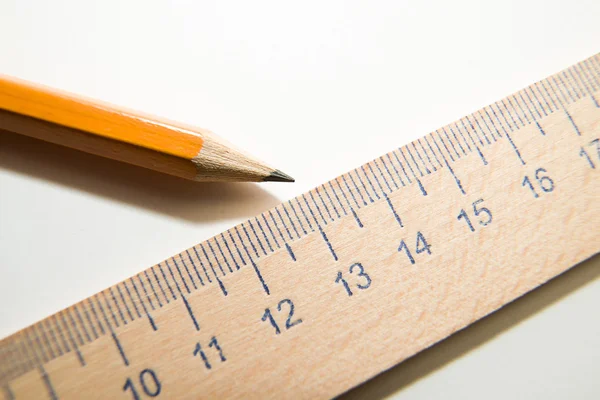 Notepads, pencil and wooden ruler on a white background — Stock Photo, Image