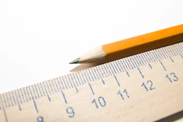 Notepads, pencil and wooden ruler on a white background — Stock Photo, Image