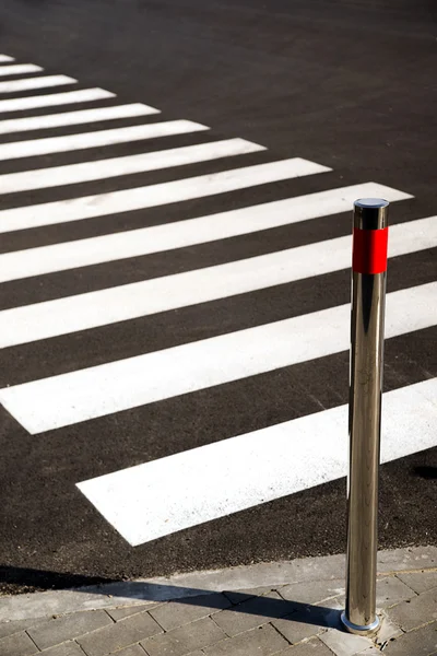 Crosswalk markings painted on asphalt in the city — Stock Photo, Image