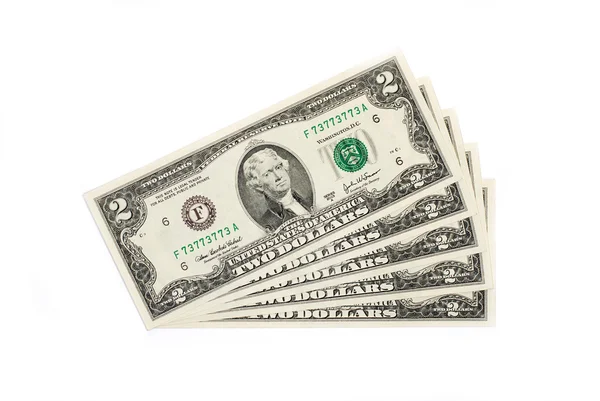 A few US banknotes on a white background — Stock Photo, Image