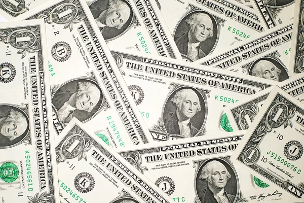 Um monte de notas de um dólar americano — Fotografia de Stock