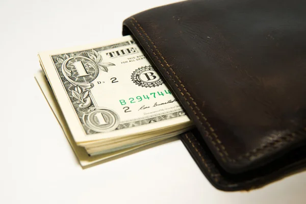 Ancien portefeuille avec billets de banque de dollars américains à l'intérieur — Photo