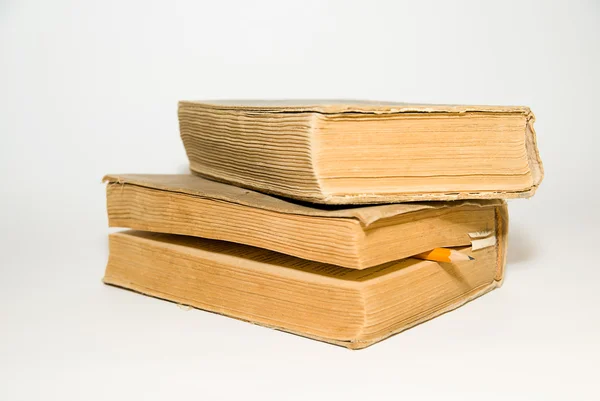 Старі великі книги на білому тлі — стокове фото