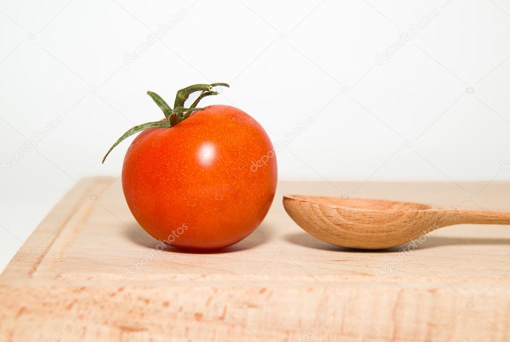 Red Ripe tomatoes on a white background