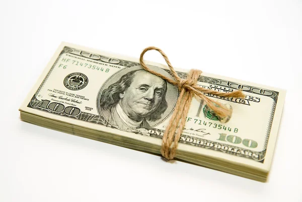 One pack of dollars on over white — Stock Photo, Image