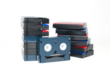 Many video cassettes are on over white clipart
