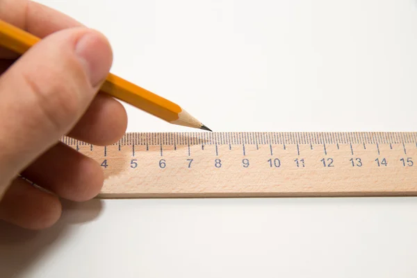 Męskie lewą ręką trzymając ołówek w białej — Zdjęcie stockowe