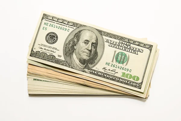 En pakke amerikanske dollars på over hvid - Stock-foto