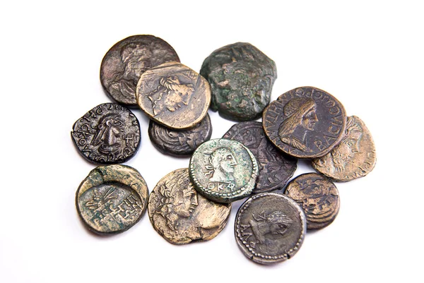 Vintage coins with portraits of kings on over white — Stock Photo, Image
