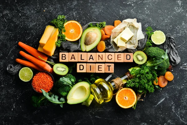Balanced Diet Inscription Avocado Carrot Orange Broccoli Dried Fruits Nuts — Stock Photo, Image