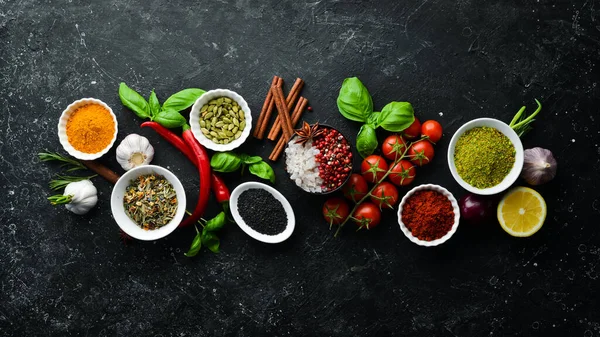 Set Colored Spices Bowls Herbs Black Stone Background View Top — Stock Photo, Image