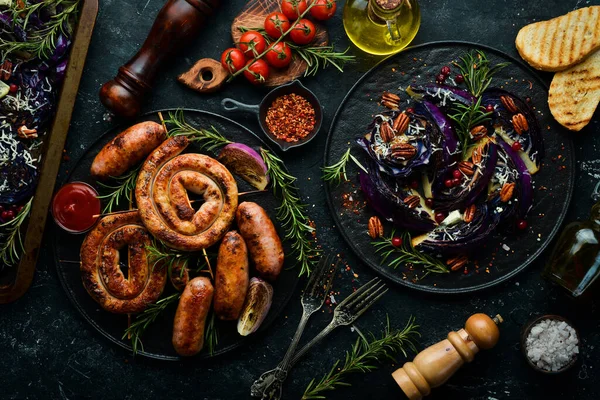 Grilled Sausages Baked Red Cabbage Cheese Rosemary Cranberries Black Plate — Stock Photo, Image