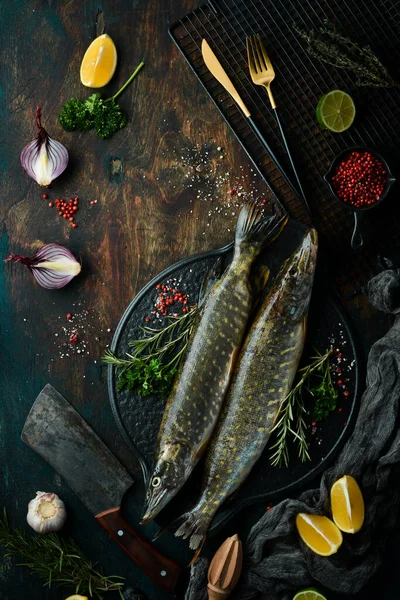 Two Fish Pike Spices Black Stone Plate Dark Background Top — Stock Photo, Image