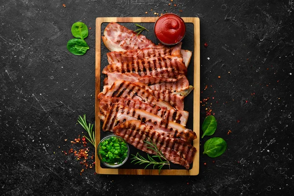 Fried Pieces Bacon Black Stone Board Top View Free Space — Stock Photo, Image