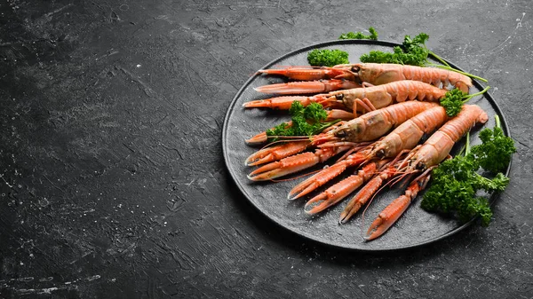 Boiled Scampi Parsley Spices Black Stone Plate Norway Lobster Black — Stock Photo, Image