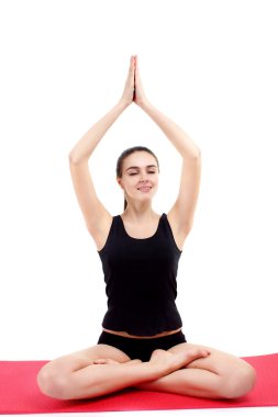 güzel genç kadın yoga studio arka plan üzerinde poz