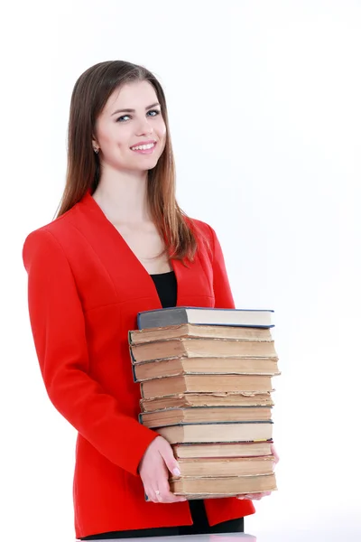 Ung student kvinna som håller massor av böcker — Stockfoto