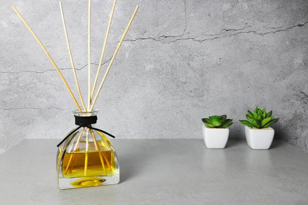 Luxury Aromatic Scented Reed Diffuser Display Decorate Grey Table Creat — Stock Photo, Image