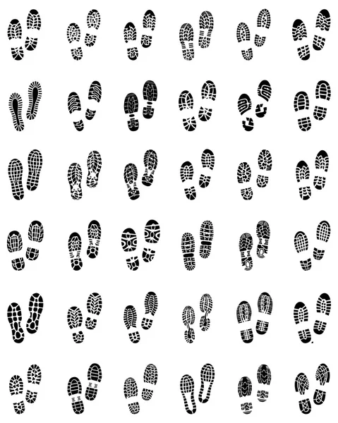 Отпечатки обуви — стоковый вектор