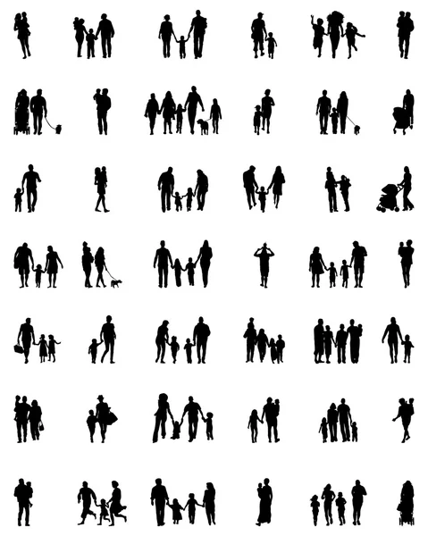 Silhouettes of families — Stock Vector