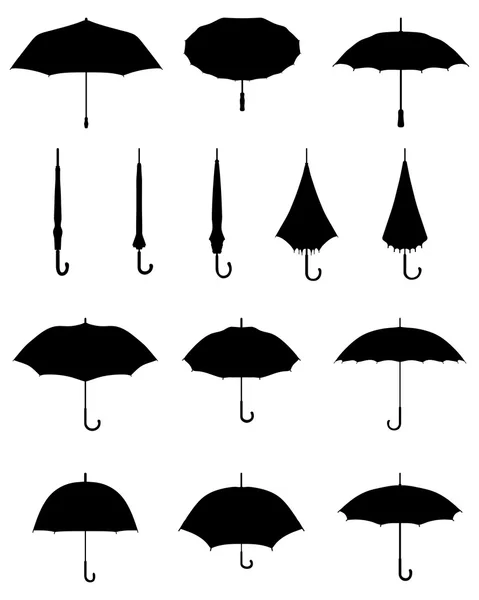 Силуэты зонтов — стоковый вектор