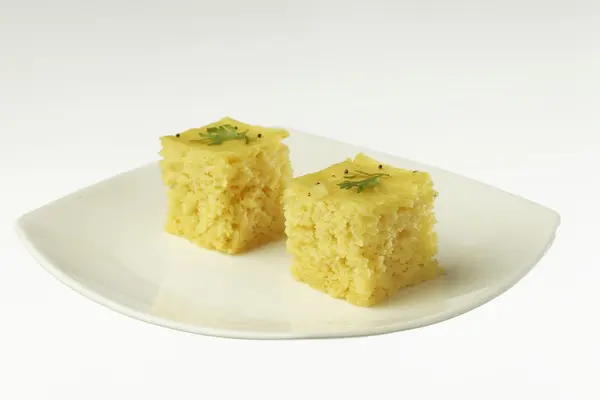 South asian indian gujarati lentil cake dhokla. — Stock Photo, Image