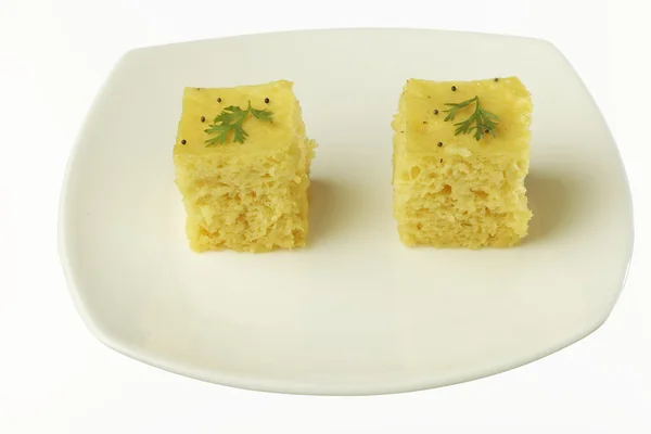 South asian indian gujarati lentil cake dhokla. — Stock Photo, Image