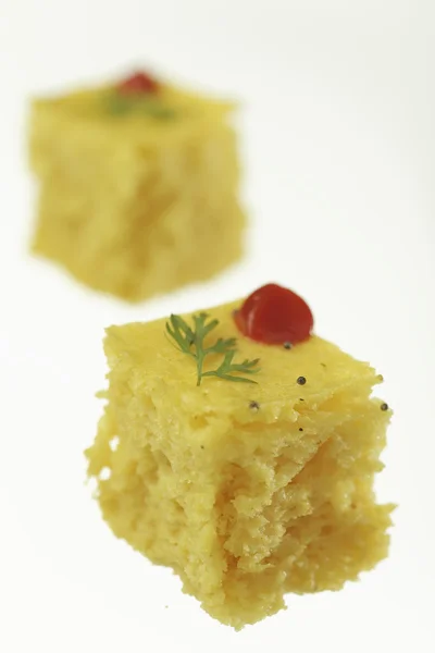 South asian indian gujarati lentil cake dhokla. — Stock Photo, Image