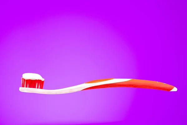 Toothbrush Toothpaste Violet Background — Stock Photo, Image