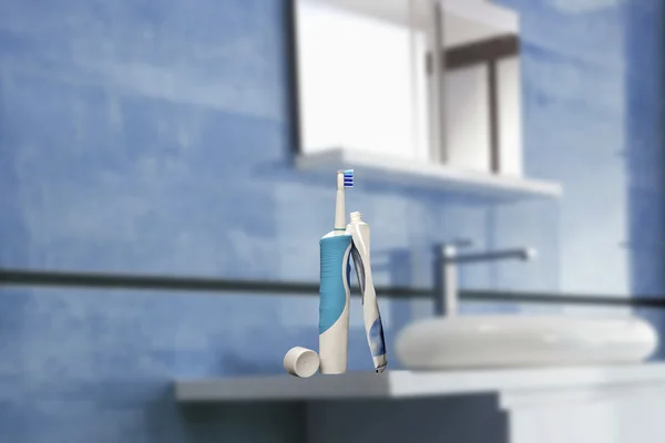 Elektrický zubní kartáček se zubní pastou — Stock fotografie