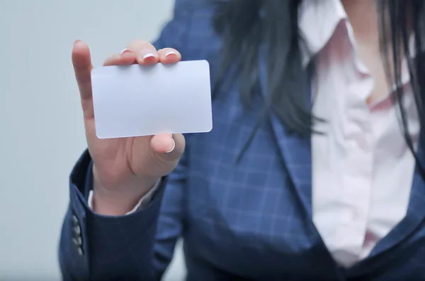 woman holding bussiness card horizontal