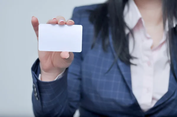 woman holding horizontal bussiness card