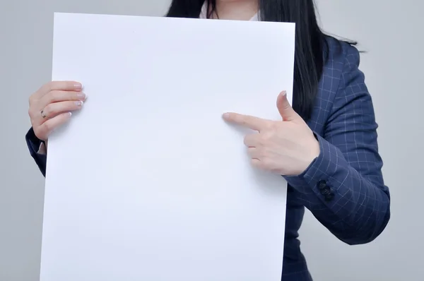 woman holding sign on white