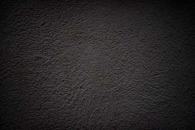 Siyah grunge arkaplan ve vignette. Alçı yüzey dokusu.
