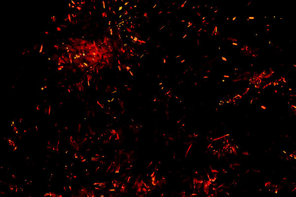 red  hot sparks on a black background