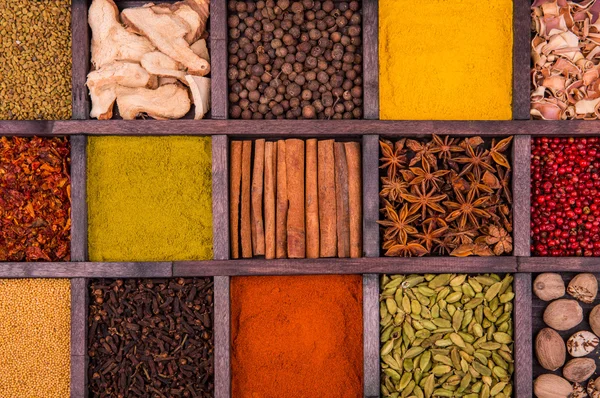 Collection of spices in a wooden box — Stock Photo, Image