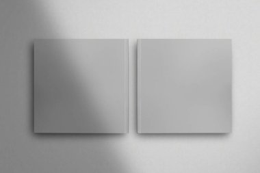 Kare dergi modelleme broşürü beyaz arka planda izole edilmiş beyaz kağıt arka plan