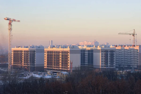 Winter Sunset Cityscape New Buildings Construction Cranes Copy Space — Stock Photo, Image