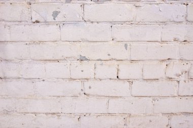 Light pink brick pattern. Old brick wall with cracks and scratches. Brickwall detail for background, texture. Vintage fence.